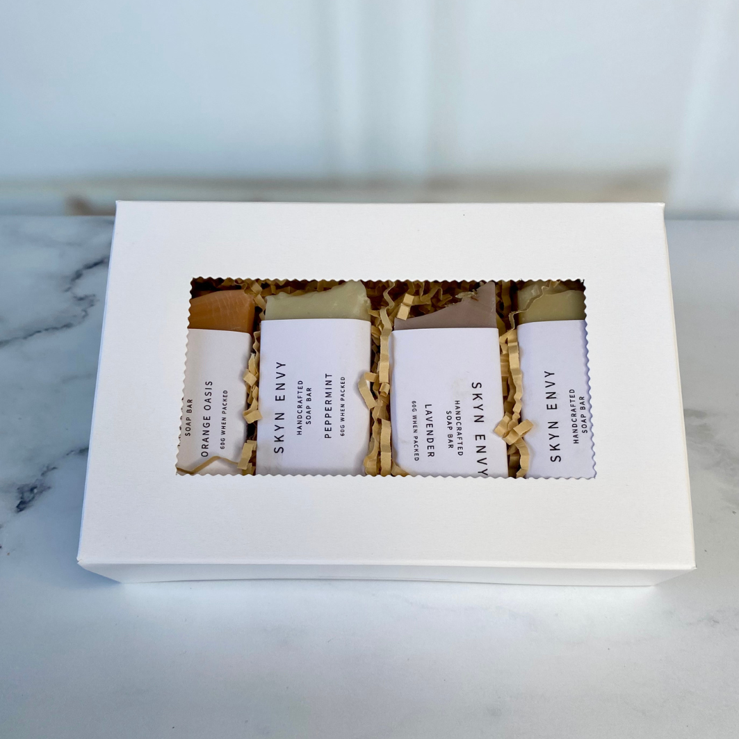 Discover the perfect blend of luxury and charm with the Mini Soap Bar Collection. This delightful set features four artisan-crafted mini bars, each infused with nature-inspired scents to pamper your skin and elevate your daily routine.